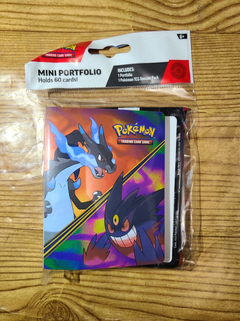 Pokemon mini portfolio with 1 Phantasma;l Flames TCG booster pack (NEW)